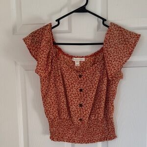 Chic Orange Floral Blouse with Button Detail